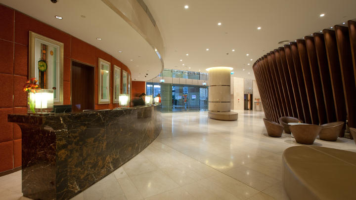 The reception area of Dubai Hotels lit by Philips Lighting